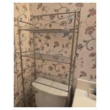 5 ft over the commode shelf unit