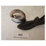 Cast iron shoe last and small said Iron