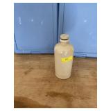 A Croc a crock bed warmer with screw in lid .