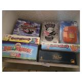 Assortment of games top of Closet
