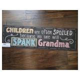 Spank grandma  metal sign