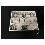 Black & White Photo, Man & 2 Women on Sofa