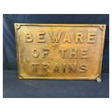 Bras Sign "Beware of Trains"