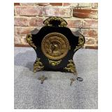 The Lisle Insonia Clock Co., Black Enameled Iron