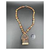 Carved Stone Pendant Necklace