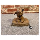 Cast iron Puppy on Bed