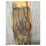 vintage surfboard featuring a fiery graphic design