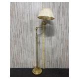 Vintage gold colored floor lamp