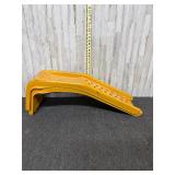 Set of yellow metal car service ramp