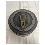 vintage Metzke nutcracker tin with brass nutcracke