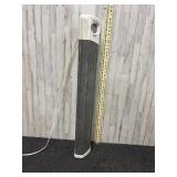 tall, white vertical electric heater, similar to m