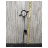 Metal circle with arrow through it garden stake