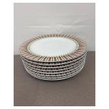 8 Sakura dinner plates in the 'Sledding Characters