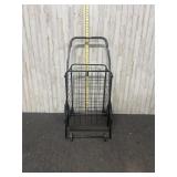 Metal cart with rotating wheels