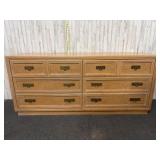 vintage-style highboy dresser or cabinet featuring