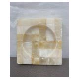 vintage stone ashtray with a checkered pattern