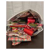 Christmas wrapping paper, ribbons, and gift suppli