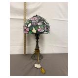 vintage floral-themed Tiffany-style table lamp
