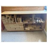 Rolling shelf with wood play blocks