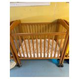 Rolling wood crib w mattress