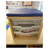 Sitting storage box with nat and contents