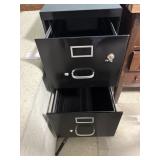 Black metal filing cabinet