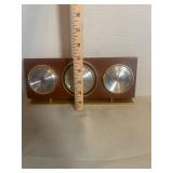 vintage Jason weather station featuring a solid wo