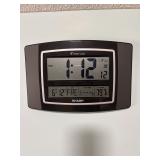 Sharp SPC900 digital atomic wall clock