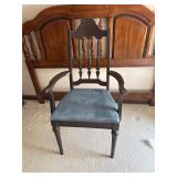 Vintage wooden arm chair with blue cushion