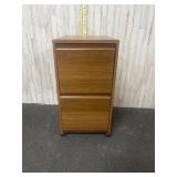 Wooden filing cabinet on casters