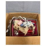 Box of sewing accessories, buttonholer, buttons