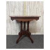 antique Victorian-style table with pink marble top