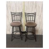 Pair of metal swivel bar chairs