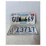 2 vintage licenses plates
