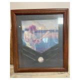 Framed artwork by artist De Santis