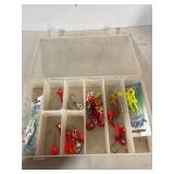 Tackle box of fishing jigs