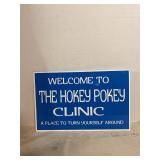 Vintage metal hockey pokey wall art
