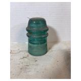 vintage aqua-colored glass insulator