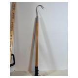 2 Fishing gaffs with wooden handle