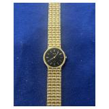 vintage Bill Blass quartz watch with yellow gold-t