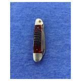 Case XX canoe-style pocket knife with etched canoe