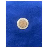 vintage 1969 Lincoln penny mounted in a gold-tone