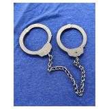 Peerless Handcuff Company nickel-finished feet res