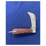 vintage Klein Tools hawkbill pocket knife with a c