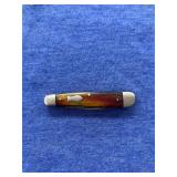 vintage pocket knife with fish design on handle