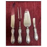 Sterling weighted handle serving ware. Stainless b
