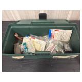 Tackle box with fishing weights and hooks