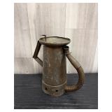 antique oil can