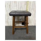 dark brown faux leather upholstered backless count