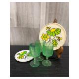 Sunflower & bee plastic dishes & green cordial gla